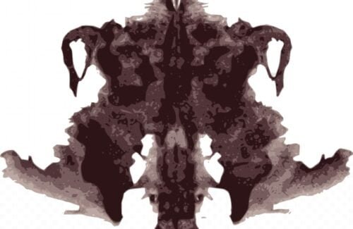 Karta ojca z talii kart pokrytych plamami atramentu Rorschacha